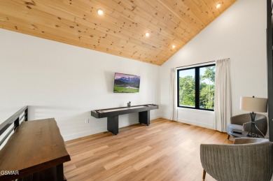 This newly constructed, fully furnished 4-bedroom, 4.5-bathroom on Sevierville Golf Club in Tennessee - for sale on GolfHomes.com, golf home, golf lot