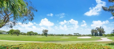 Stunning golf views. Mid-century modern home in the prestigious on Normandy Shores Golf Course in Florida - for sale on GolfHomes.com, golf home, golf lot