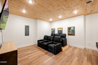 This newly constructed, fully furnished 4-bedroom, 4.5-bathroom on Sevierville Golf Club in Tennessee - for sale on GolfHomes.com, golf home, golf lot