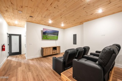 This newly constructed, fully furnished 4-bedroom, 4.5-bathroom on Sevierville Golf Club in Tennessee - for sale on GolfHomes.com, golf home, golf lot