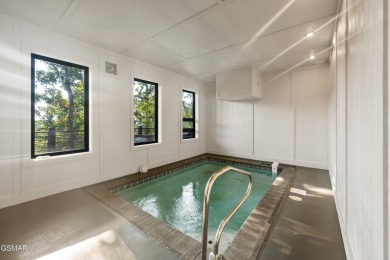 This newly constructed, fully furnished 4-bedroom, 4.5-bathroom on Sevierville Golf Club in Tennessee - for sale on GolfHomes.com, golf home, golf lot