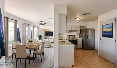 This Sun City home is freshly painted inside and out with on Sun City Lakes West and East in Arizona - for sale on GolfHomes.com, golf home, golf lot