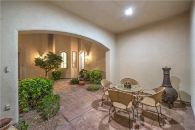 Located within Red Rock Country Club, this exquisite 4-bedroom on Red Rock Country Club in Nevada - for sale on GolfHomes.com, golf home, golf lot