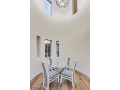 Located within Red Rock Country Club, this exquisite 4-bedroom on Red Rock Country Club in Nevada - for sale on GolfHomes.com, golf home, golf lot