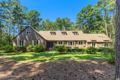 Fall in love with this country cottage style home!   This on Carolina Shores Golf Course in North Carolina - for sale on GolfHomes.com, golf home, golf lot