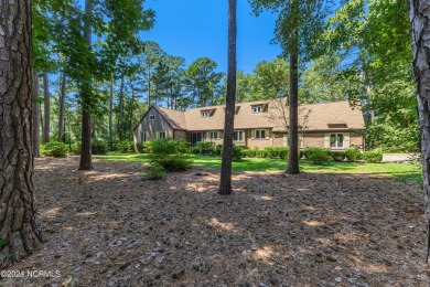 Fall in love with this country cottage style home!   This on Carolina Shores Golf Course in North Carolina - for sale on GolfHomes.com, golf home, golf lot