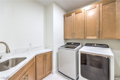 Located within Red Rock Country Club, this exquisite 4-bedroom on Red Rock Country Club in Nevada - for sale on GolfHomes.com, golf home, golf lot