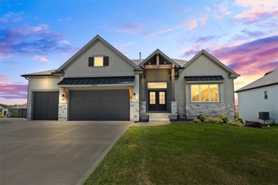 This 4-bedroom, 4-bath reverse 1.5-story is packed with upgrades on Heritage Park Golf Course in Kansas - for sale on GolfHomes.com, golf home, golf lot