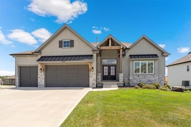 This 4-bedroom, 4-bath reverse 1.5-story is packed with upgrades on Heritage Park Golf Course in Kansas - for sale on GolfHomes.com, golf home, golf lot