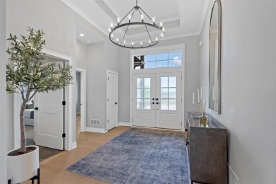 This 4-bedroom, 4-bath reverse 1.5-story is packed with upgrades on Heritage Park Golf Course in Kansas - for sale on GolfHomes.com, golf home, golf lot