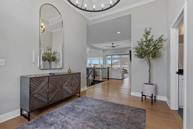 This 4-bedroom, 4-bath reverse 1.5-story is packed with upgrades on Heritage Park Golf Course in Kansas - for sale on GolfHomes.com, golf home, golf lot