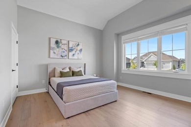This 4-bedroom, 4-bath reverse 1.5-story is packed with upgrades on Heritage Park Golf Course in Kansas - for sale on GolfHomes.com, golf home, golf lot