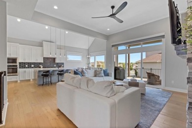 This 4-bedroom, 4-bath reverse 1.5-story is packed with upgrades on Heritage Park Golf Course in Kansas - for sale on GolfHomes.com, golf home, golf lot