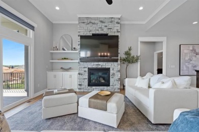 This 4-bedroom, 4-bath reverse 1.5-story is packed with upgrades on Heritage Park Golf Course in Kansas - for sale on GolfHomes.com, golf home, golf lot