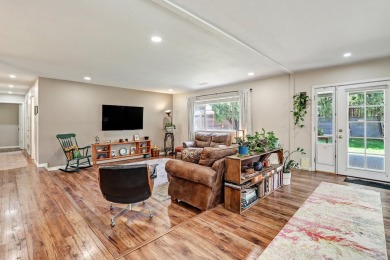 Welcome to this charming home offering tons of updates! Enter on Arroyo Del Oso Golf Course in New Mexico - for sale on GolfHomes.com, golf home, golf lot