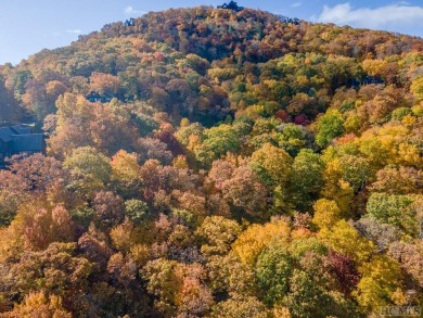 This homesite offers stunning year round mountain views and is on Old Edwards Club in North Carolina - for sale on GolfHomes.com, golf home, golf lot