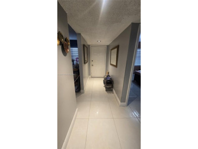 This beautifully remodeled 2/2 unit has a gorgeous view. This on Flamingo Lakes Country Club in Florida - for sale on GolfHomes.com, golf home, golf lot