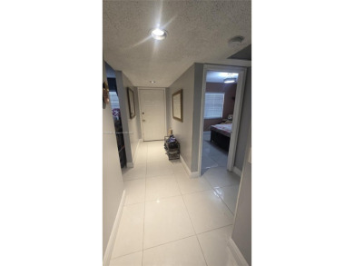 This beautifully remodeled 2/2 unit has a gorgeous view. This on Flamingo Lakes Country Club in Florida - for sale on GolfHomes.com, golf home, golf lot