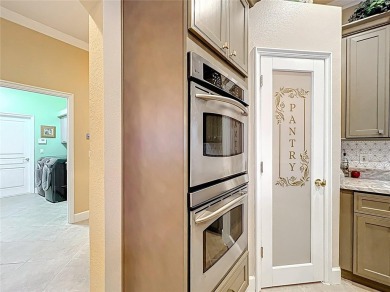 Meticulously maintained 4-bedroom, 3-bathroom home nestled on The Legends Golf and Country Club in Florida - for sale on GolfHomes.com, golf home, golf lot