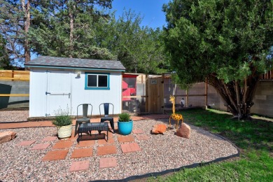 Welcome to this charming home offering tons of updates! Enter on Arroyo Del Oso Golf Course in New Mexico - for sale on GolfHomes.com, golf home, golf lot