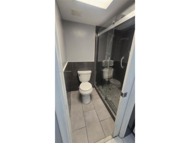 This beautifully remodeled 2/2 unit has a gorgeous view. This on Flamingo Lakes Country Club in Florida - for sale on GolfHomes.com, golf home, golf lot