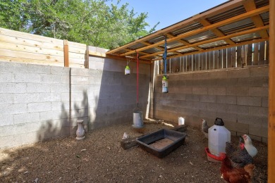 Welcome to this charming home offering tons of updates! Enter on Arroyo Del Oso Golf Course in New Mexico - for sale on GolfHomes.com, golf home, golf lot