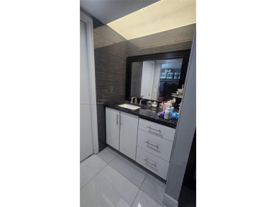 This beautifully remodeled 2/2 unit has a gorgeous view. This on Flamingo Lakes Country Club in Florida - for sale on GolfHomes.com, golf home, golf lot