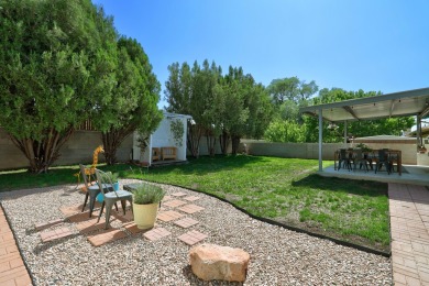 Welcome to this charming home offering tons of updates! Enter on Arroyo Del Oso Golf Course in New Mexico - for sale on GolfHomes.com, golf home, golf lot
