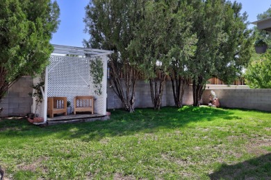 Welcome to this charming home offering tons of updates! Enter on Arroyo Del Oso Golf Course in New Mexico - for sale on GolfHomes.com, golf home, golf lot