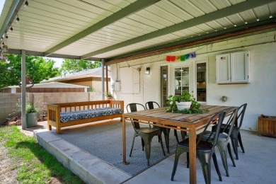 Welcome to this charming home offering tons of updates! Enter on Arroyo Del Oso Golf Course in New Mexico - for sale on GolfHomes.com, golf home, golf lot