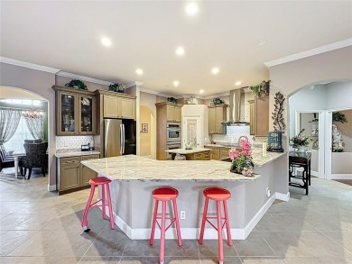 Meticulously maintained 4-bedroom, 3-bathroom home nestled on The Legends Golf and Country Club in Florida - for sale on GolfHomes.com, golf home, golf lot