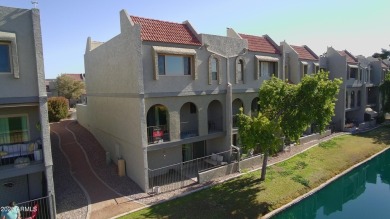 This updated 3-story townhome offers 3 bedrooms, 3 bathrooms on Dobson Ranch Municipal Golf Course in Arizona - for sale on GolfHomes.com, golf home, golf lot