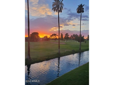 This updated 3-story townhome offers 3 bedrooms, 3 bathrooms on Dobson Ranch Municipal Golf Course in Arizona - for sale on GolfHomes.com, golf home, golf lot