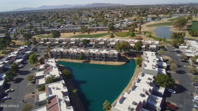 This updated 3-story townhome offers 3 bedrooms, 3 bathrooms on Dobson Ranch Municipal Golf Course in Arizona - for sale on GolfHomes.com, golf home, golf lot