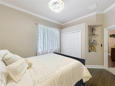 Meticulously maintained 4-bedroom, 3-bathroom home nestled on The Legends Golf and Country Club in Florida - for sale on GolfHomes.com, golf home, golf lot