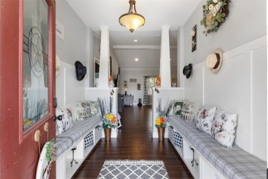 This beautifully designed stone home with blue and red accents on Lighthouse Golf Course in Texas - for sale on GolfHomes.com, golf home, golf lot