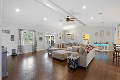 This beautifully designed stone home with blue and red accents on Lighthouse Golf Course in Texas - for sale on GolfHomes.com, golf home, golf lot