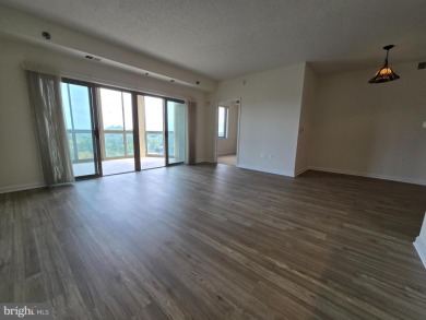 Sky-high living in this top floor condo with 2 spacious bedrooms on Leisure World Golf Club in Maryland - for sale on GolfHomes.com, golf home, golf lot