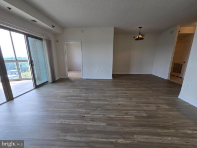 Sky-high living in this top floor condo with 2 spacious bedrooms on Leisure World Golf Club in Maryland - for sale on GolfHomes.com, golf home, golf lot