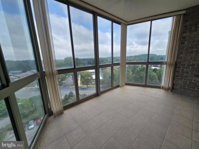 Sky-high living in this top floor condo with 2 spacious bedrooms on Leisure World Golf Club in Maryland - for sale on GolfHomes.com, golf home, golf lot