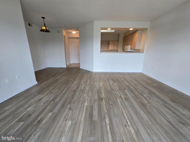 Sky-high living in this top floor condo with 2 spacious bedrooms on Leisure World Golf Club in Maryland - for sale on GolfHomes.com, golf home, golf lot