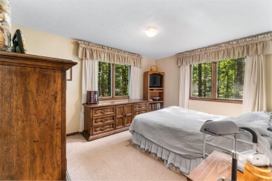 Enjoy sweeping golf course views and your own personal cart path on Gaylord Country Club in Michigan - for sale on GolfHomes.com, golf home, golf lot