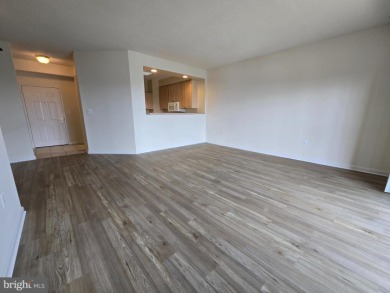 Sky-high living in this top floor condo with 2 spacious bedrooms on Leisure World Golf Club in Maryland - for sale on GolfHomes.com, golf home, golf lot
