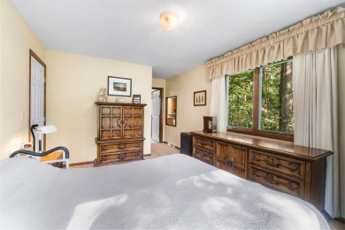 Enjoy sweeping golf course views and your own personal cart path on Gaylord Country Club in Michigan - for sale on GolfHomes.com, golf home, golf lot