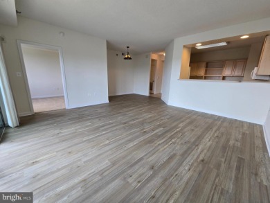 Sky-high living in this top floor condo with 2 spacious bedrooms on Leisure World Golf Club in Maryland - for sale on GolfHomes.com, golf home, golf lot