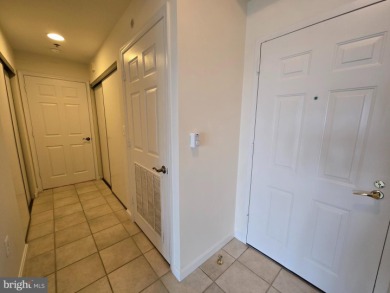 Sky-high living in this top floor condo with 2 spacious bedrooms on Leisure World Golf Club in Maryland - for sale on GolfHomes.com, golf home, golf lot