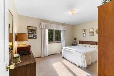 Enjoy sweeping golf course views and your own personal cart path on Gaylord Country Club in Michigan - for sale on GolfHomes.com, golf home, golf lot