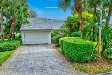 This charming villa in the Essex community offers serene water on Hunters Run Golf and Country Club in Florida - for sale on GolfHomes.com, golf home, golf lot