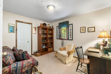 Enjoy sweeping golf course views and your own personal cart path on Gaylord Country Club in Michigan - for sale on GolfHomes.com, golf home, golf lot