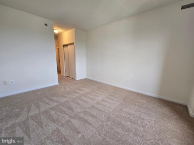 Sky-high living in this top floor condo with 2 spacious bedrooms on Leisure World Golf Club in Maryland - for sale on GolfHomes.com, golf home, golf lot